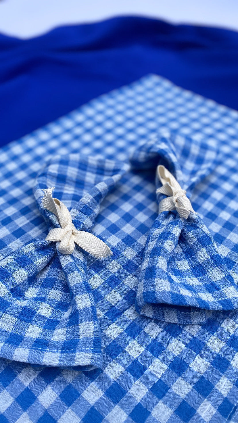 2 serviettes de table nouées avec des liens en coton